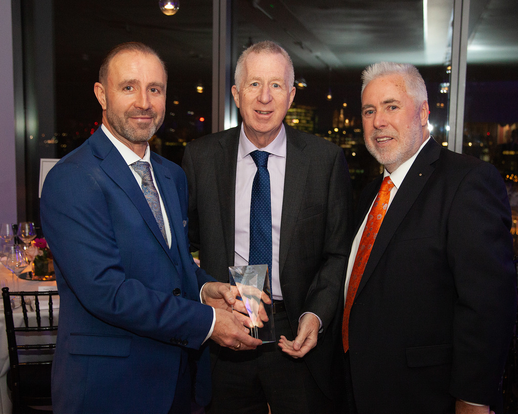 British Institute Freight Association Director General presents Sandford Freight Managing Director Roy Walker and Chairman Sean Sandford with an award recognising 20 years as a freight forwarding company.
